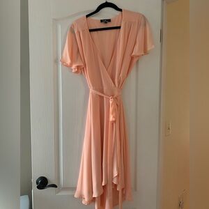 Lulu's peach colored flowy wrap dress
